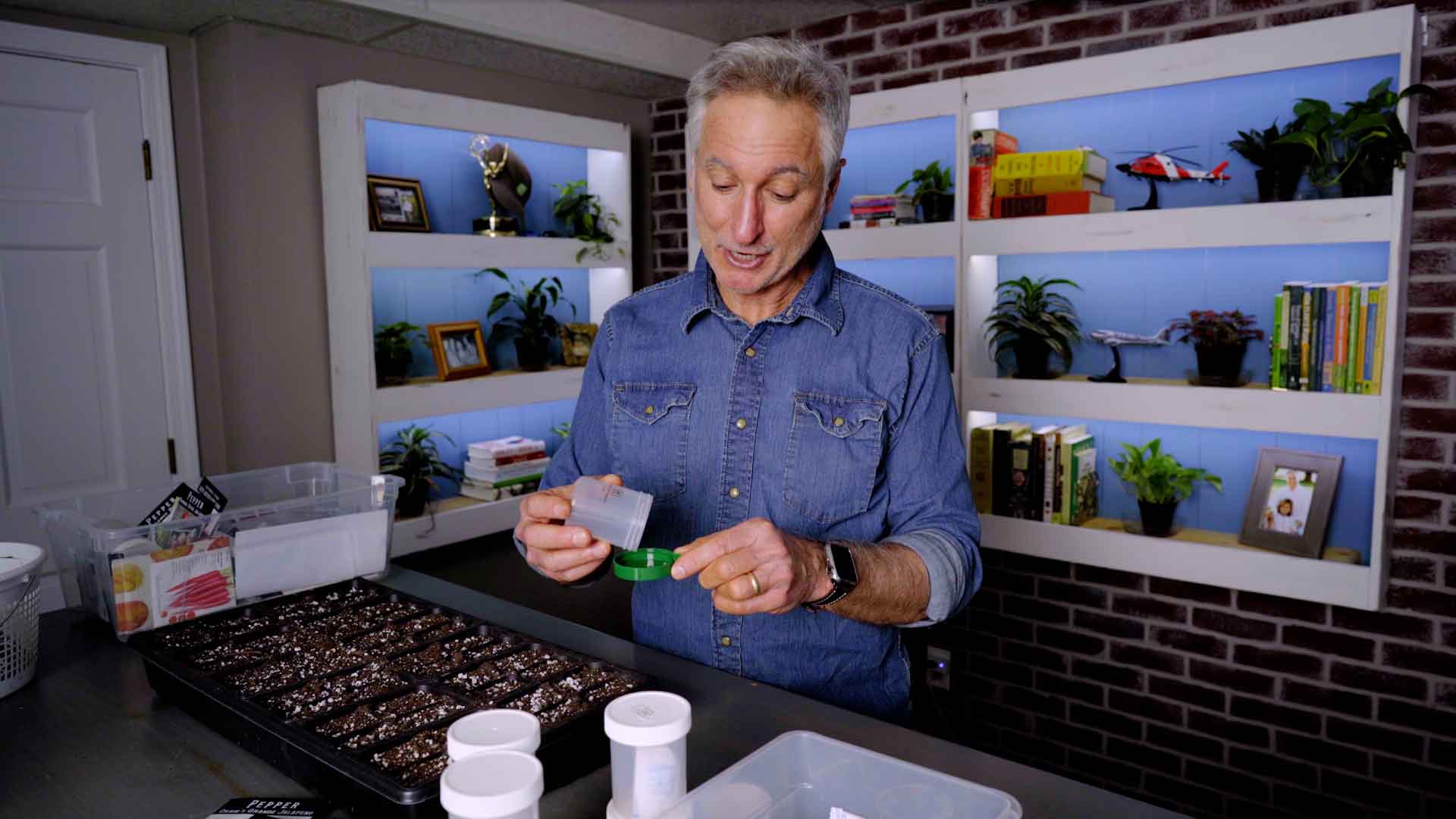 Joe Lamp'l showing a heirloom seed.