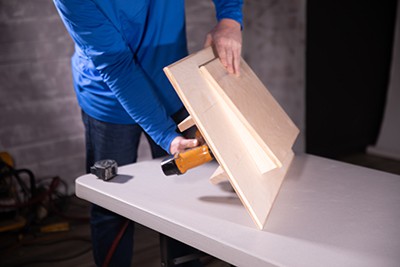 using nail gun to secure wood pieces together