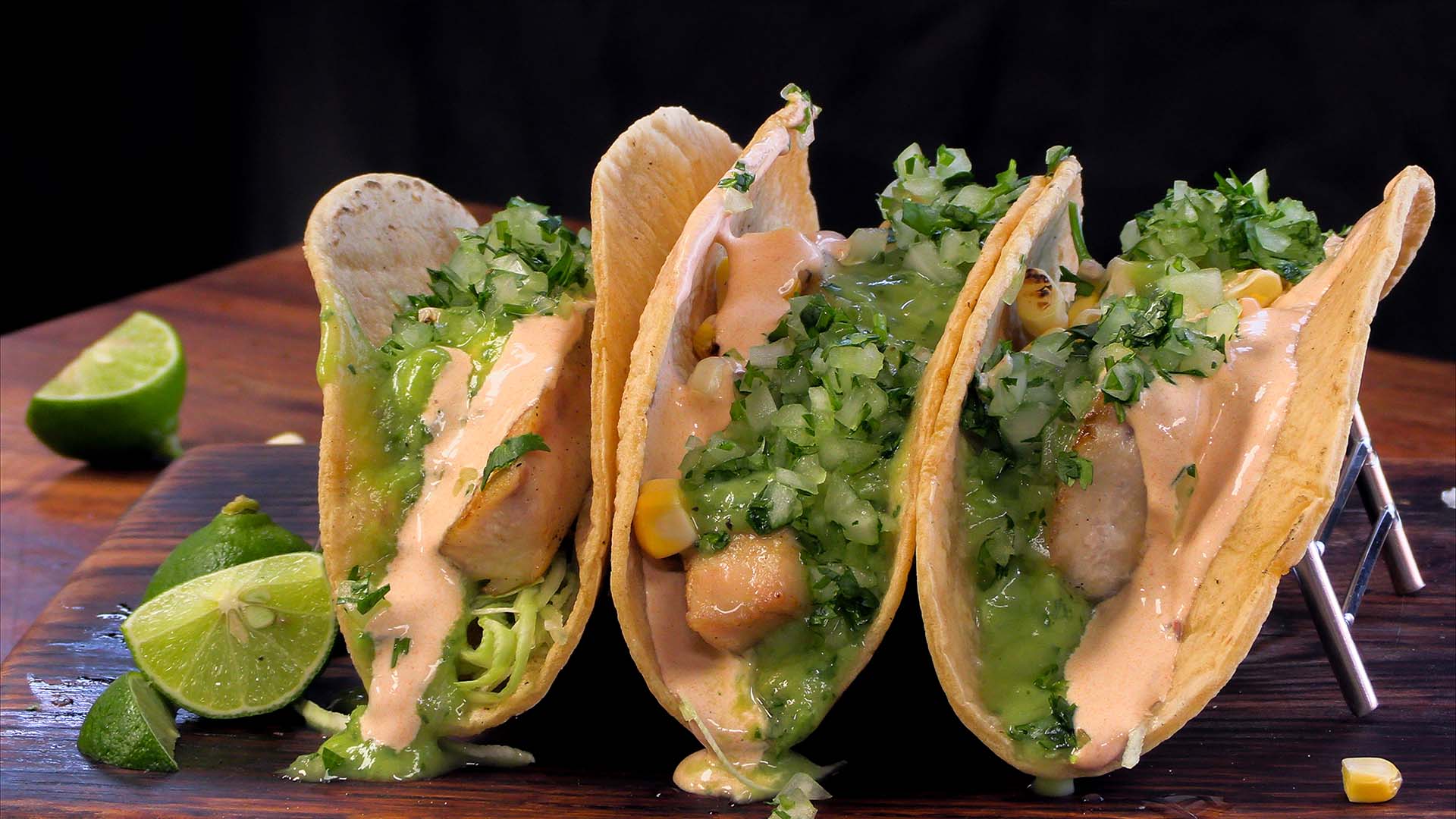 #4 - Mahi Mahi tacos with avocado salsa and spicy crema