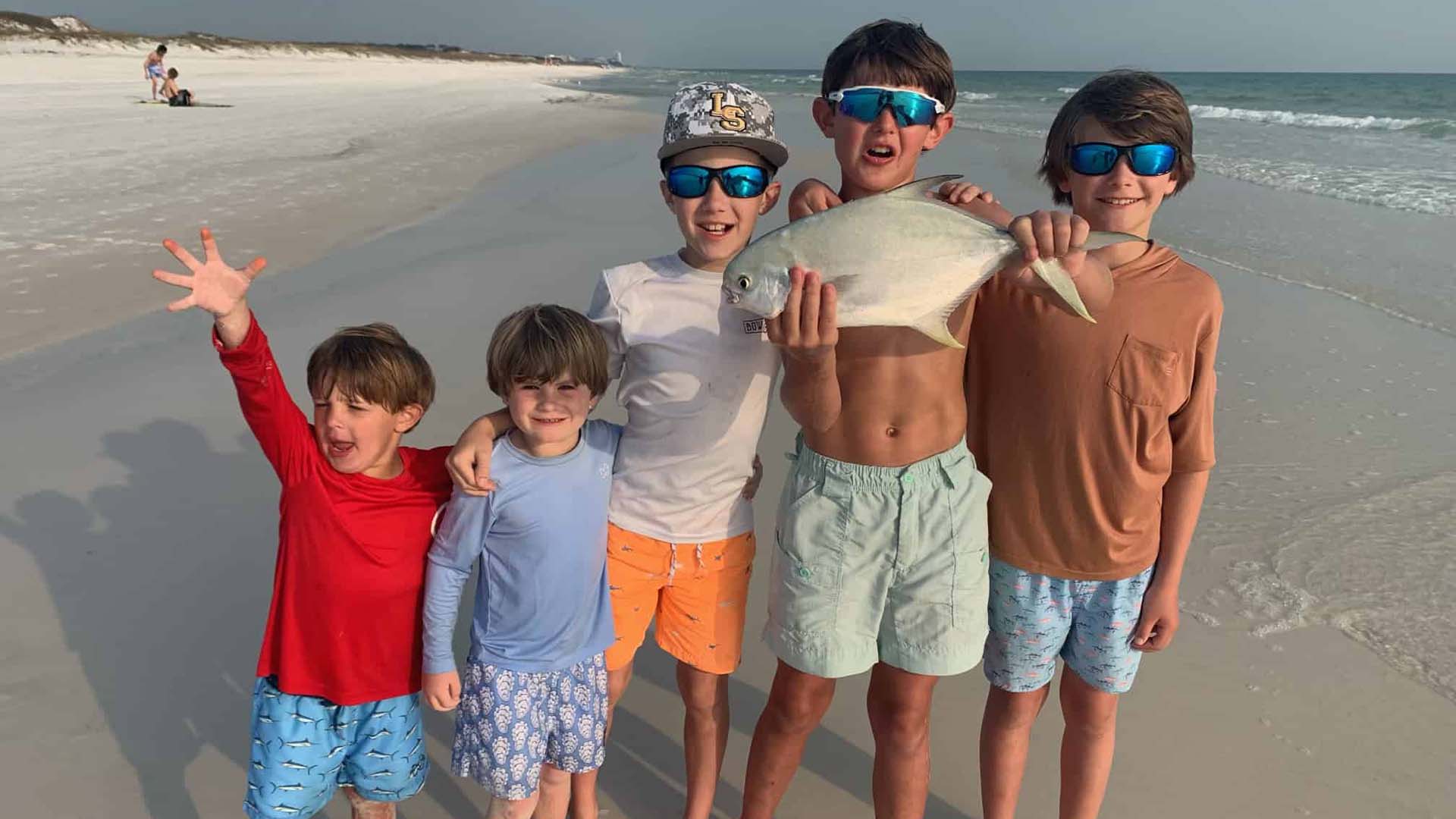 Bancroft Kids showing off their fresh pompano catch