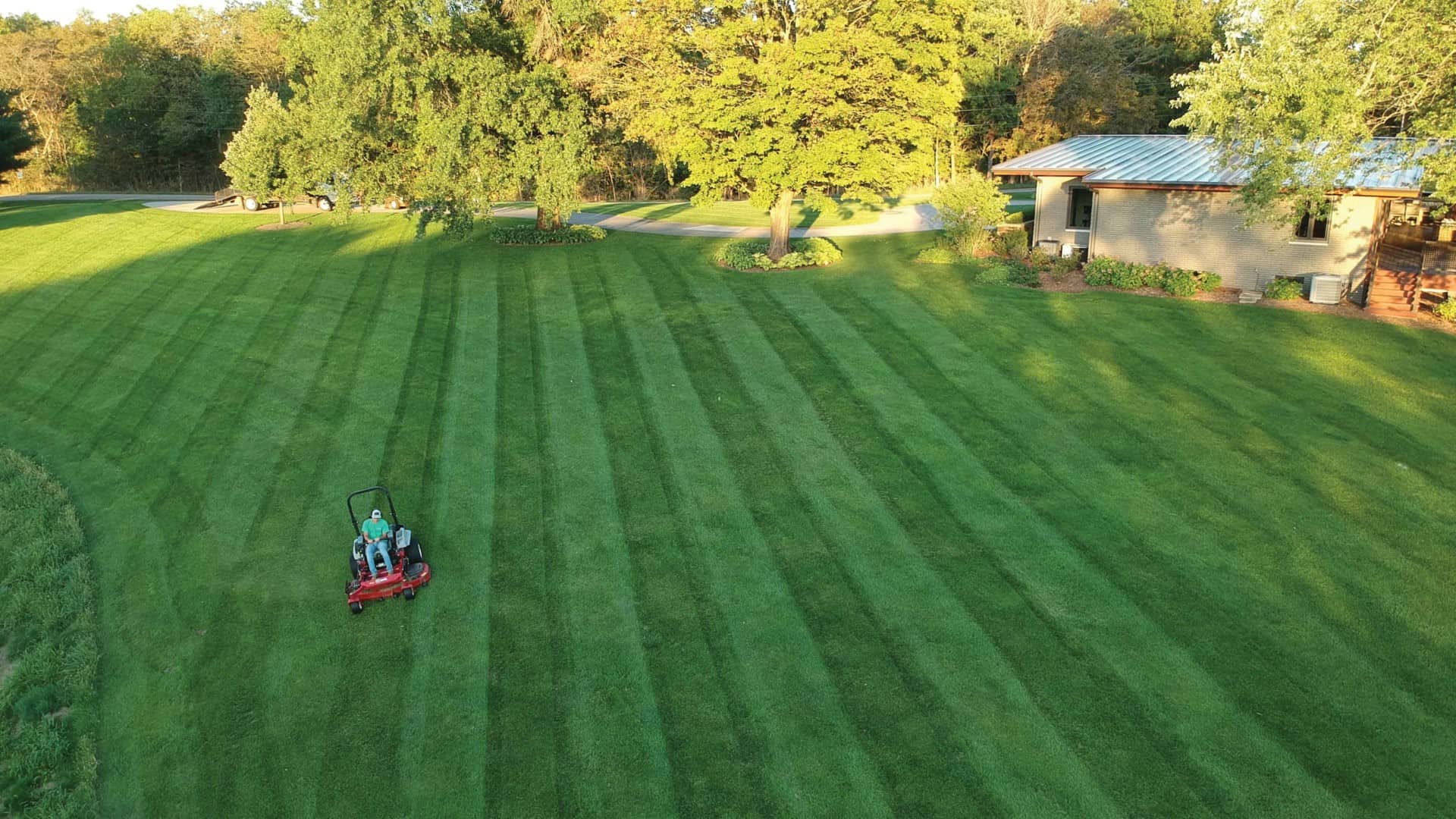 Mowing a lawn and the visual effect of striped lawns