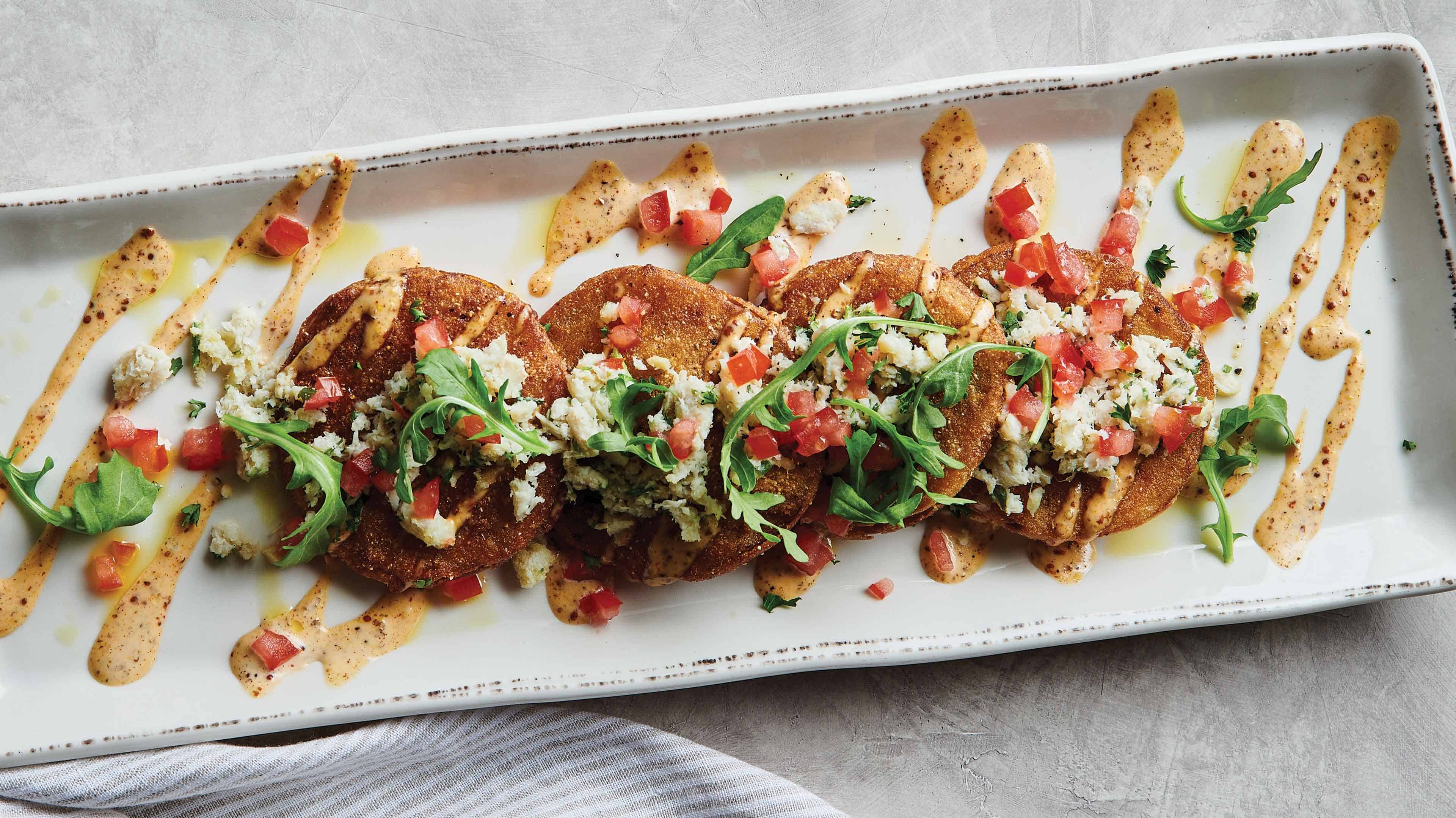 Fried green tomatoes on serving platter