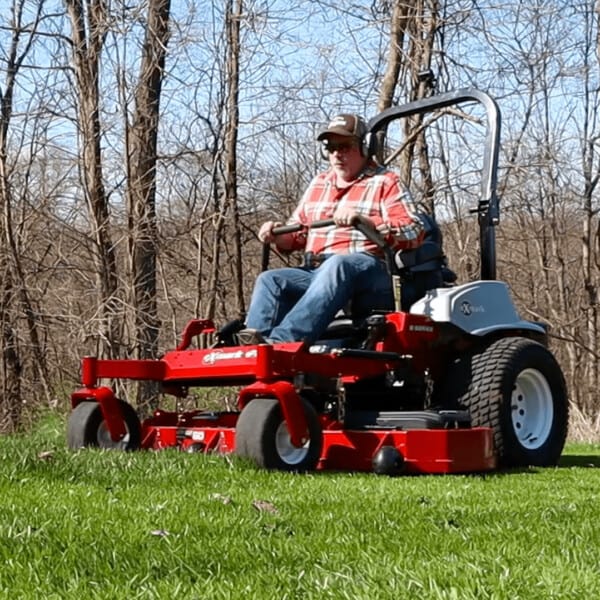 Mike Morgan mowing yard