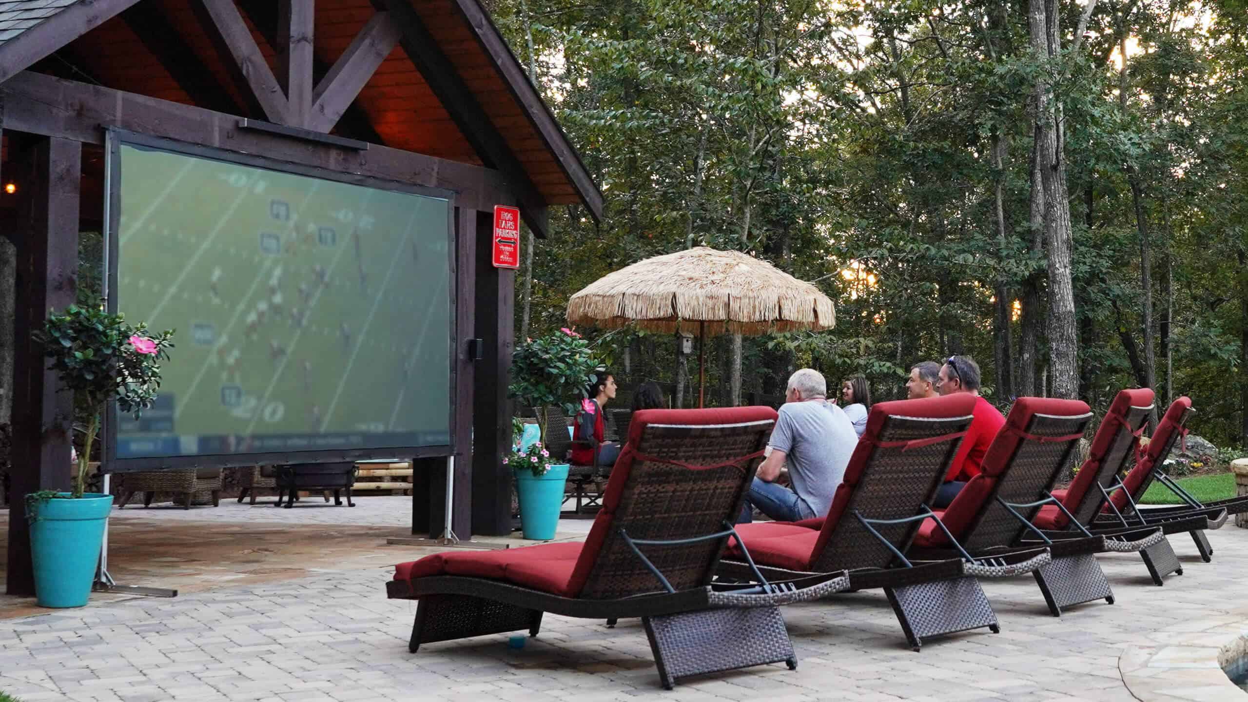 Lounge chairs watching football game outside