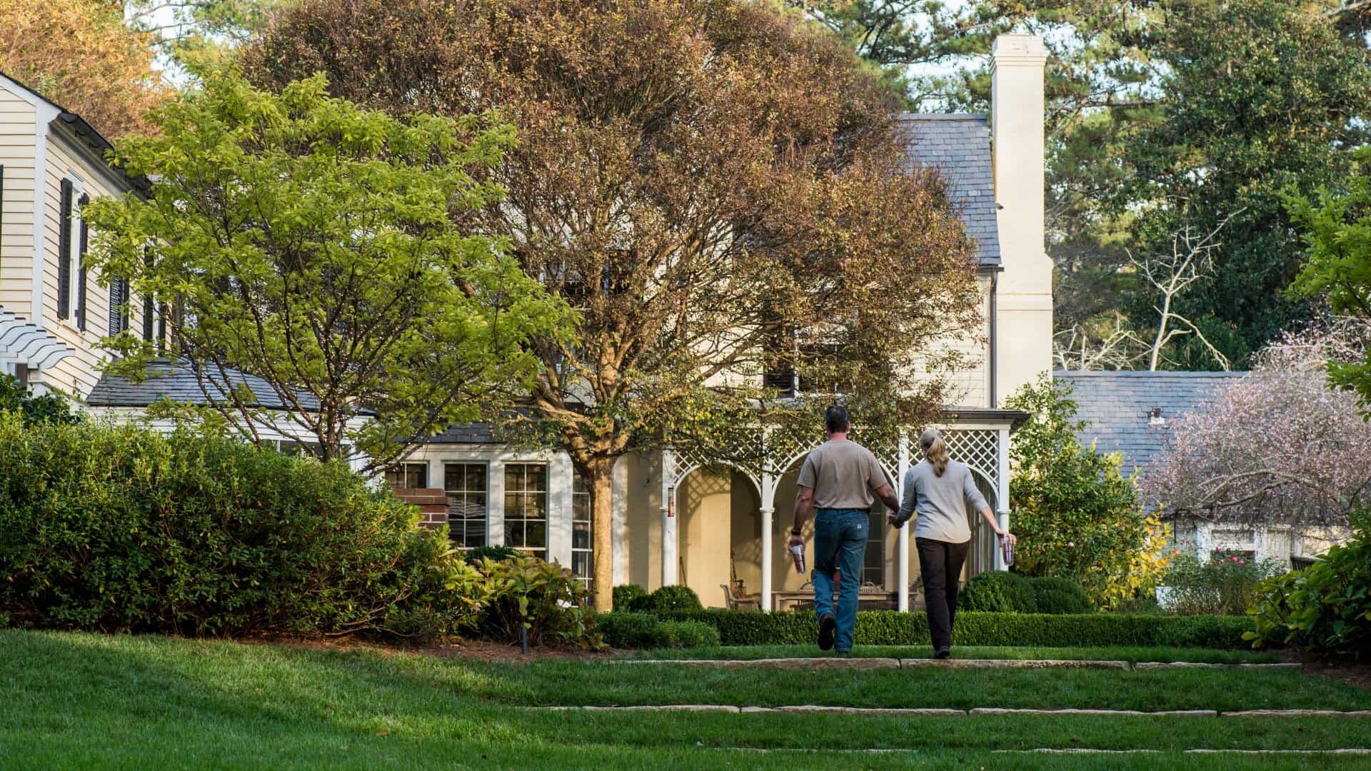 Couple walking to house