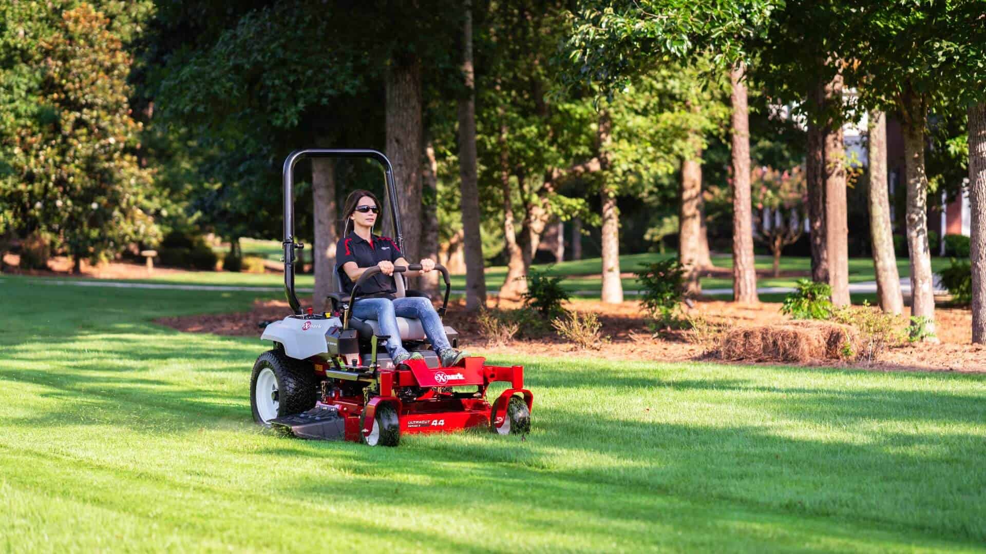 Mowing lawn around landscape