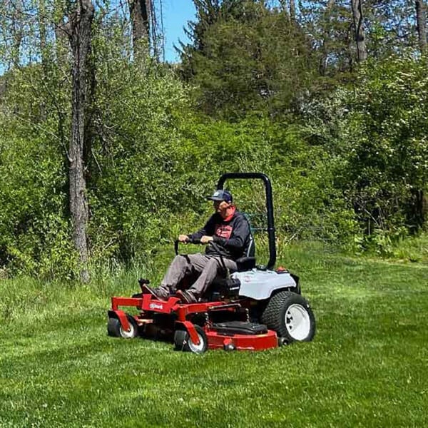 Grae Buck mowing field