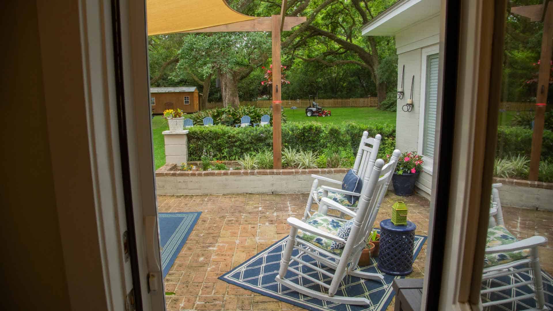 Unobstructed view of a outdoor space through a retractable screen door.