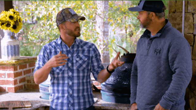 Two men talking about grilling