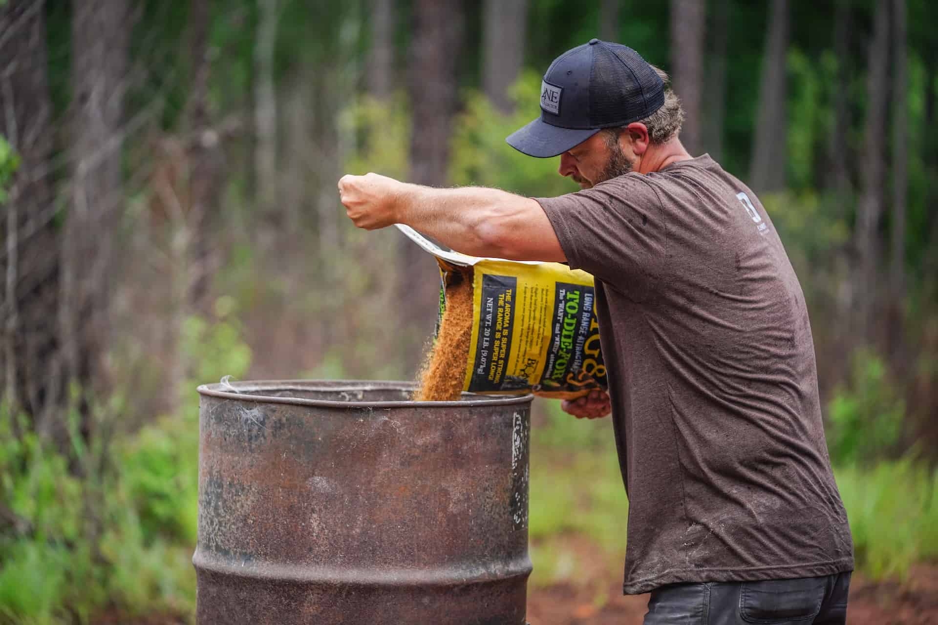 Mike Waddell supplements his wildlife habitat with feed barrels
