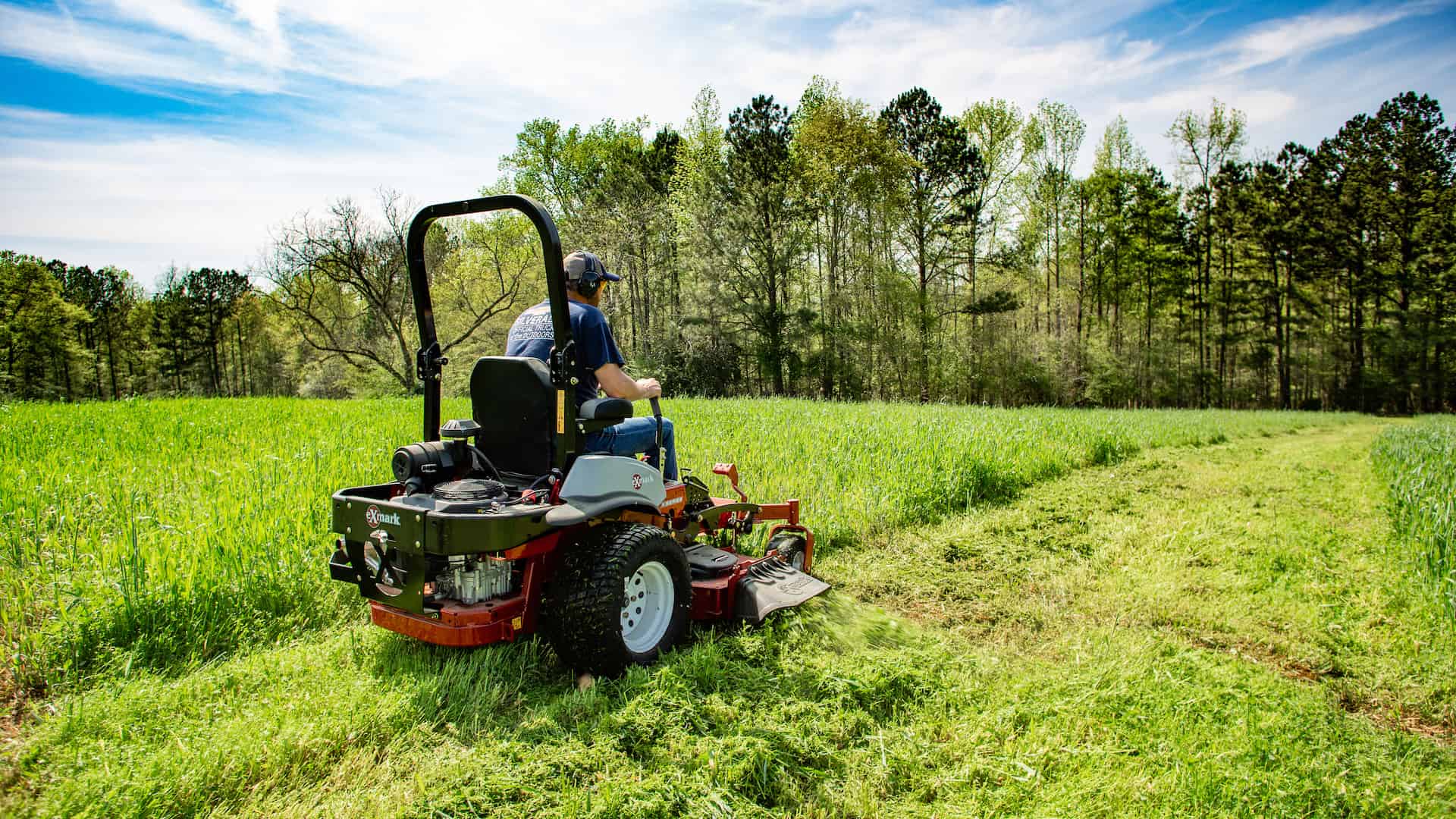 Mike Waddell mowing field on his Exmark zero-turn