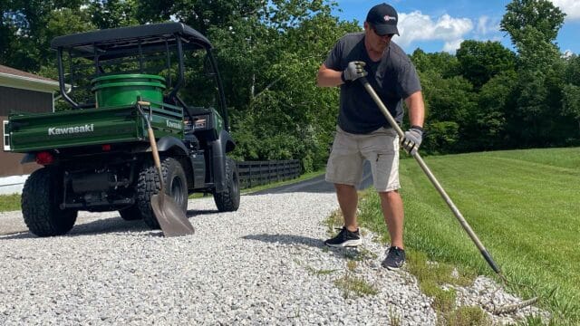 Joe raking gravel