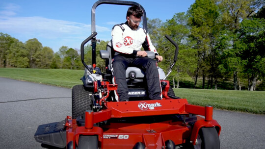 Austin Dillon on lawn mower talking about safety